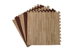 Set of reversible wood tiles in light and dark oak finishes arranged in a fanned layout on display